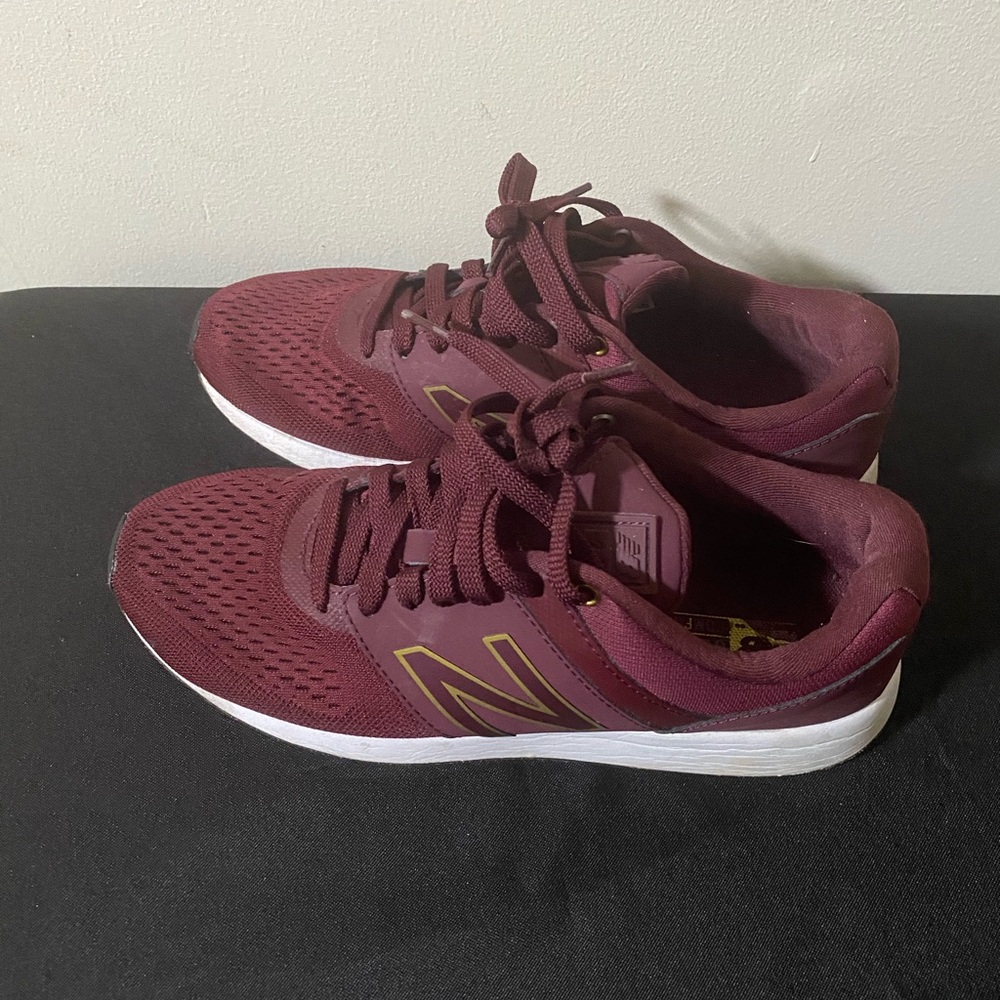 New Balance Women's Maroon Sneakers with Gold Accents